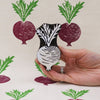 A hand carved Indian wooden printing block in a Beetroot design, can be used for hand printing fabric and paper.
