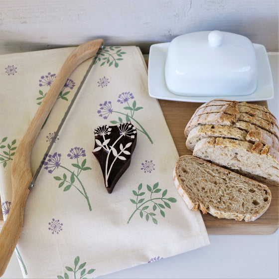 A hand printed Tea Towel, printed using Indian wooden printing blocks and fabric paint in Oxfordshire