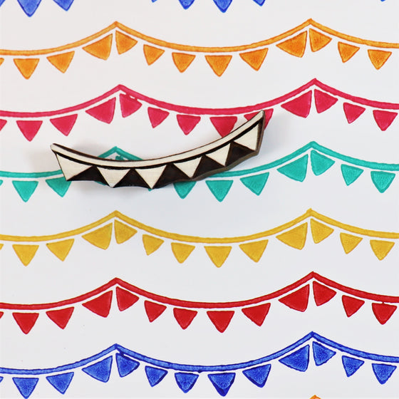 Hand block  printed paper in a Bunting design
