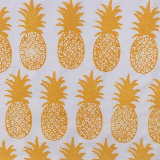 Hand block printed fabric in a yellow Pineapple design, printed with fabric paint using a wooden printing block