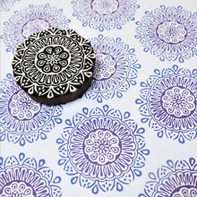  A hand carved Indian wooden printing block in a traditional Indian mandala design