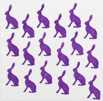 Hand block printed fabric in a purple Rabbit design