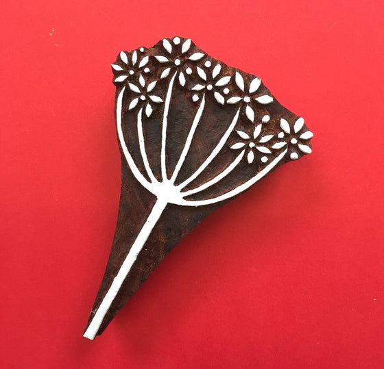 A hand carved Indian wooden printing block in a Cow Parsley design