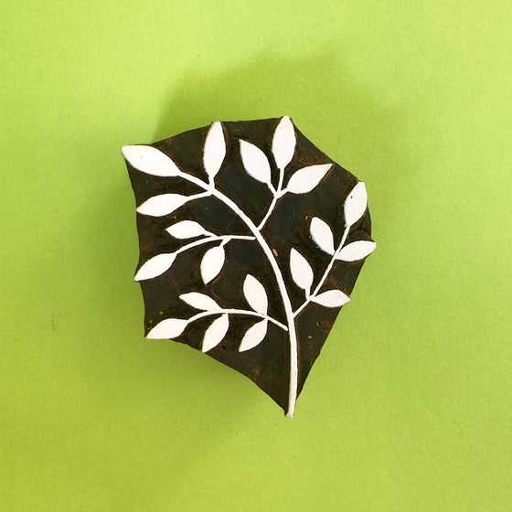 A hand carved Indian wooden printing block in a Leaf Bunch design