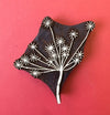 A hand carved Indian wooden printing block in a Multi Seed Head design