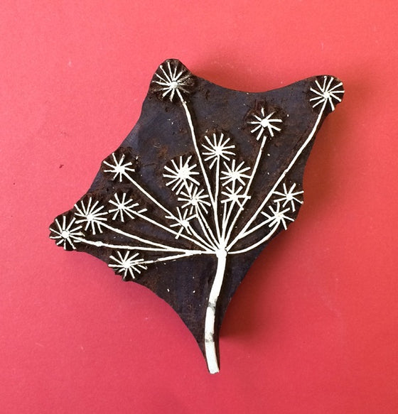 A hand carved Indian wooden printing block in a Multi Seed Head design