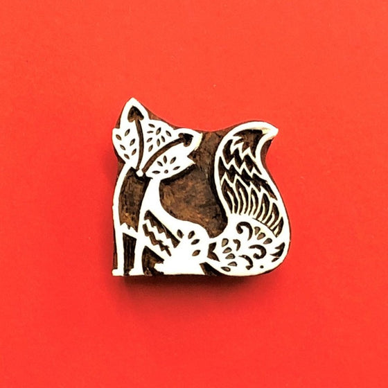 A hand carved Indian wooden printing block in a Stylised Fox design, Block printing in Oxfordshire