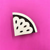 A hand carved Indian wooden printing block in a Watermelon Slice design