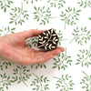 A photo of a indian wooden printing block in a Leaf Bunch design