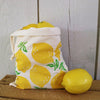 A block printed drawstring bag in a Leafy Lemon design
