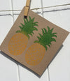 A hand carved Indian wooden printing block in a Pineapple design
