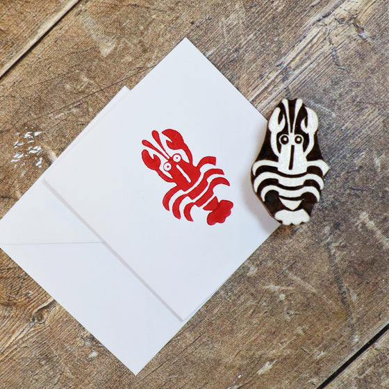 A hand block printed card, printed using a lobster Indian wooden printing block